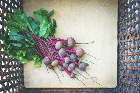 Fresh raw bunch of beetroot in wooden bos.