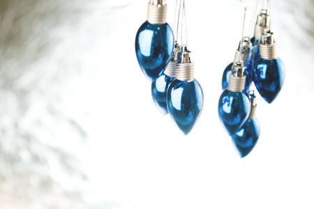 Classic blue color of 2020 year christmas bulb lights on a white background.の写真素材