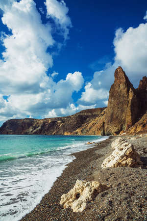 Bright blue color Black sea shore of Crimea peninsula with high cliff on the cost. Paradise stone beach.の写真素材