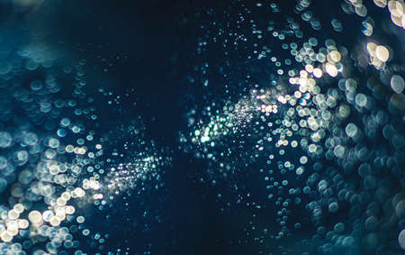 Abstract water drops background toned with classic blue trend color 2020.の写真素材