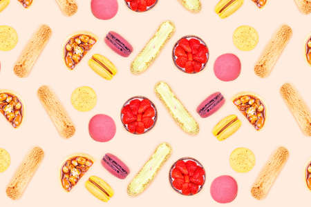 Pattern made of plenty colorful desserts, such as strawberry and nuts tarts, eclairs, macarons.  Flat lay style for holiday party.の写真素材
