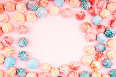 Soft pink, blue and orange color mini marshmallows dessert top viewの写真素材