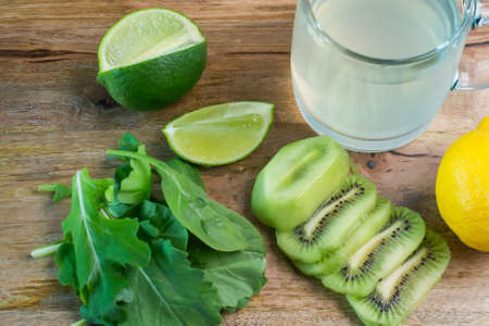 Ingredients for detox smoothie on wooden tableの写真素材