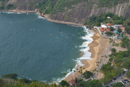Rio de Janeiro, Brazil. 10 June 2016. Aerial view of Praia Vermelha from the sugar loaf. Kayekers enjoy the morning at his secluded beach at the mouth of the Guanabara Bay.のeditorial素材