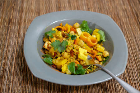 A vegetarian meal with a complete set of amino-acids (protein), beans (tofu and garbanzo beans) and...