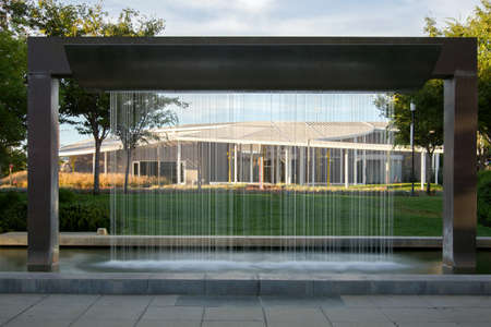 Davis, California, USA, 17 July 2017. North view of the Jan Shrem and Maria Manetti Shrem museum for the arts viewed through a water fountain, the University of California, Davis.のeditorial素材