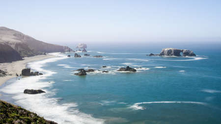 Panoramic view of the Pacific Coast and Arched Rock at Sonoma Coast state Park, California, USA, on a sunny Summer day.の写真素材