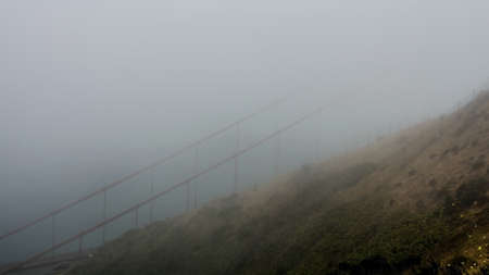 Golden Gate Bridge concealed by the fog on a summer morning, viewed from Battery Spencer, a Fort Baker siteの写真素材