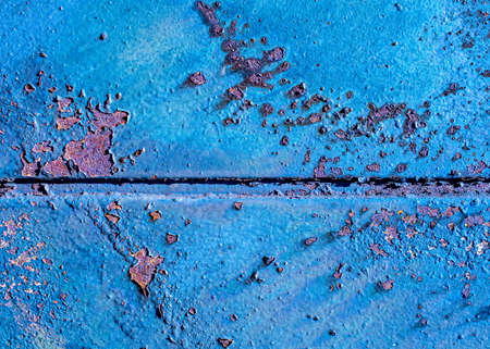 Rusty metal pink plate with grunge, pealing off blue paint - abstract texture background-...