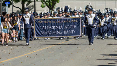 Davis, CA - April 21, 2018. California Aggie Marching Band during parade at UC Davis annual Picnic day. During picnic day the university showcases its departments. There are family activities all over campus focusing on education.のeditorial素材