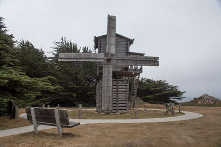 Old Mill in Fort Ross State Park, California, USA, close-up, on a foggy, overcast day typical of the...