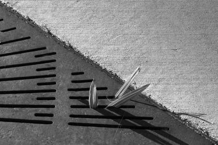 Palm tree breaking into the light through a sewer on the, illustrating the concept of resilience,...