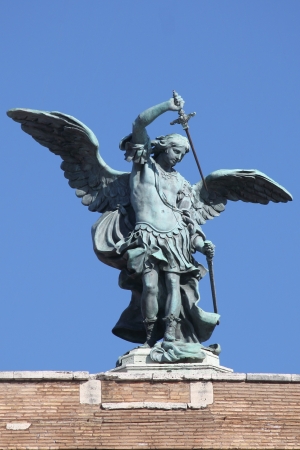 Saint Michael Archangel statue on the top of Saint Angel castle in Rome, Italyの写真素材