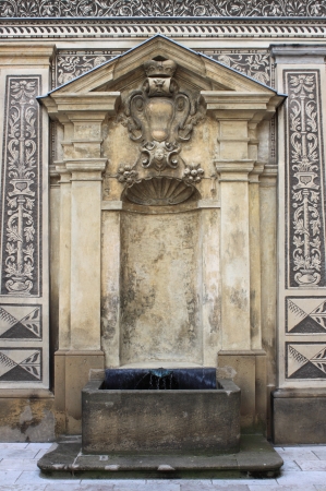 Renaissance fountain in Schwarzenberg Palace of Prague, Czech Republicの写真素材