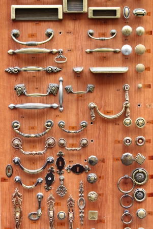 Bronze and brass door knobs sold in a hardware storeの写真素材