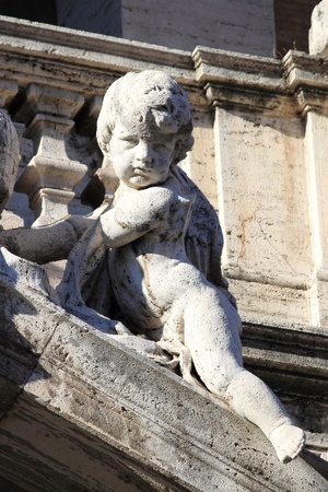 Angel statue on the facade of Saint Mary Major Basilica in Rome, Italyの写真素材