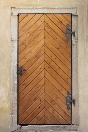 Medieval front door in the downtown of Prague, Czech Republicの写真素材