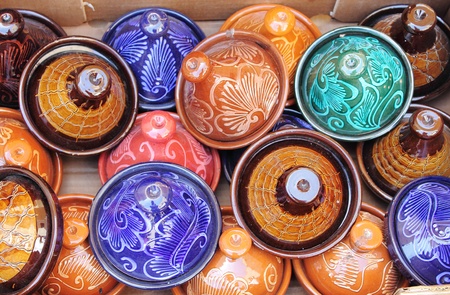 Colorful Tajines for sale in a market stallの写真素材