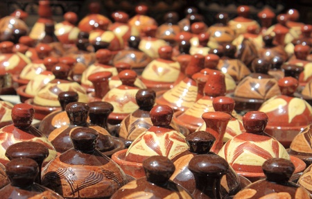 Many tajines for sale in a market stallの写真素材