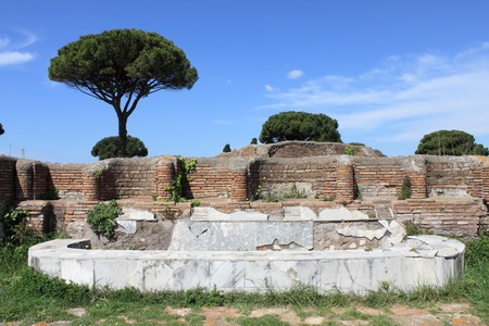 Ancient fountain basin in Ostia Antica, the old harbour of Rome, Italyの写真素材