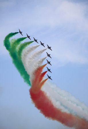ROME - JUNE 29  The italian acrobatic team Frecce Tricolori perform at the Rome International Air Show on June 29, 2014 in Rome, Italyのeditorial素材