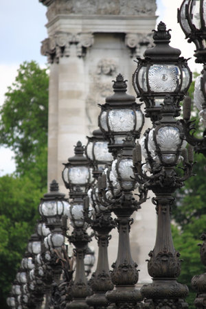 Street lamps in Alexandre III Bridge in Paris, Franceのeditorial素材