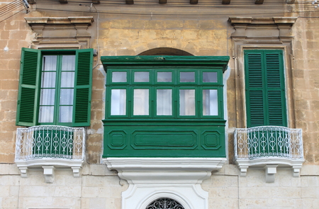 Typical colorful balconies and windows in Maltaの写真素材