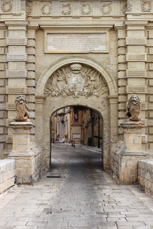 Ancient limestone gateway into city of Mdina, Maltaのeditorial素材