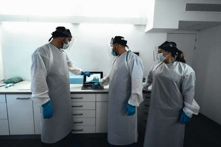 Specialist doctors fighting against corona virus outbreak - Science and medical teamwork examining...