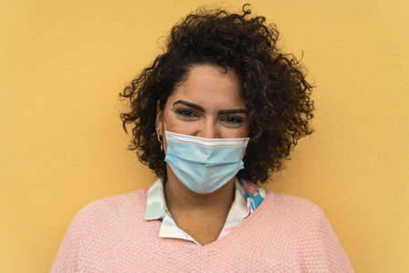 Woman wearing face surgical mask for preventing and stop corona virus spreadの写真素材