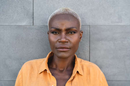 African senior woman portrait - Elderly afro female looking in front of cameraの写真素材