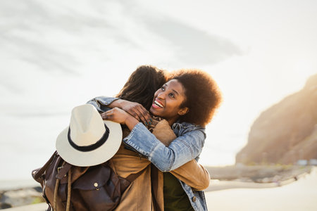 Happy young couple dating romantic moment while embracing outdoor - Youth people love and relationship conceptの写真素材