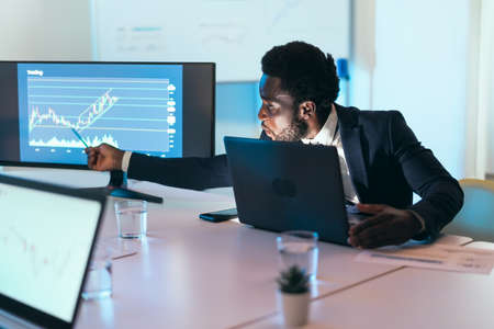 Business stock trader man working on crypto currency markets with blockchain technology - Decentralized finance and stock exchange conceptの写真素材