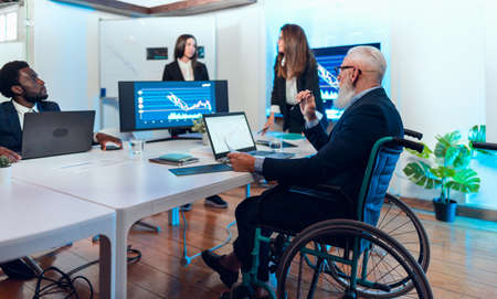 Business stock traders people in meeting room working on crypto currency markets with blockchain technology - Decentralized finance and stock exchange conceptの写真素材