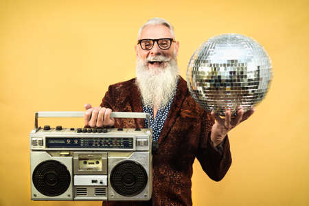 Happy senior man having party celebrating holidays eventの写真素材