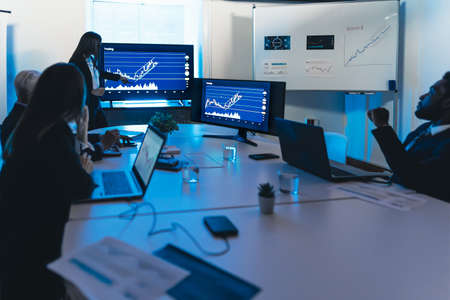 Business traders people in meeting room working on crypto currency markets with blockchain technology - Decentralized finance and stock exchange conceptの写真素材