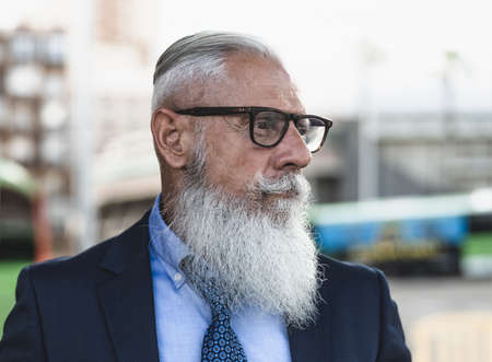 Portrait of fashion senior man going to work - Elderly people lifestyle conceptの写真素材