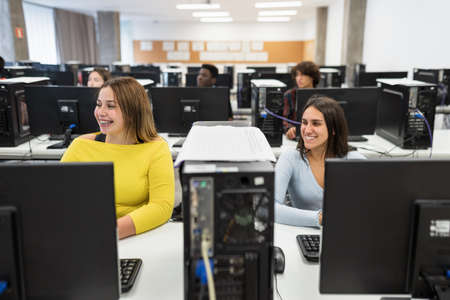 Young students listening a lecture inside university classroom - Education conceptの写真素材