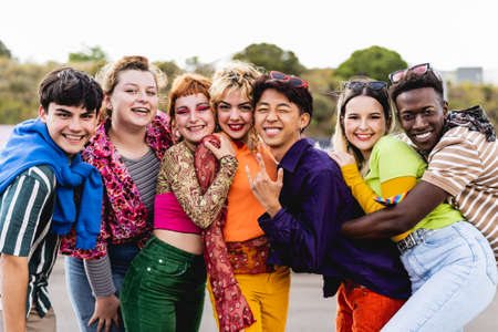 Happy young diverse friends having fun hanging out together - Youth people millennial generation conceptの写真素材