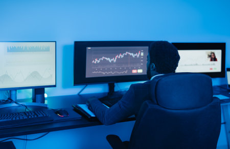 Financial analyst working on stock exchange market in office - Fintech concept