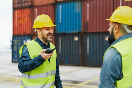 Industrial engineers working in logistic terminal of container cargoの写真素材
