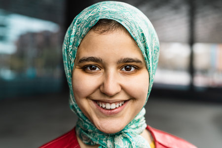 Happy Muslim girl smiling in cameraの写真素材