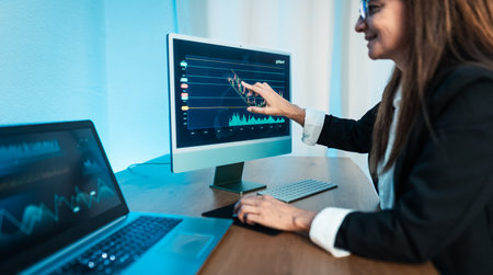 Financial analyst working on stock exchange market in modern office - Fintech conceptの写真素材