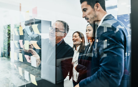 Multiracial business team working in modern office - Entrepreneurship and teamwork conceptの写真素材