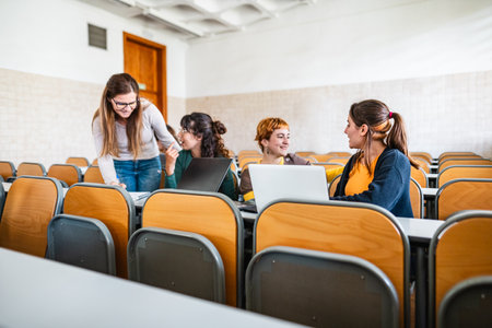 Young friends studying inside university classroom - School education conceptの写真素材