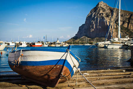 Boat in San Vito harbor after fishingの写真素材