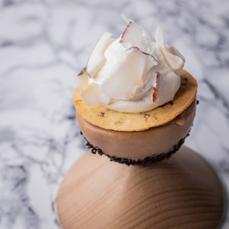 Shots of small pastries, tartlet, danube, truffles and semifreddo.の写真素材