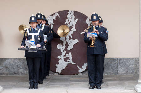 Music band of local police in milano. Show in the street.