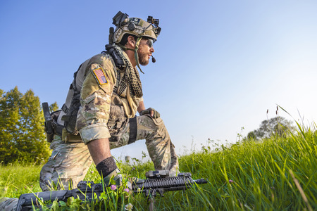 Portrait of American Soldier on blue sky backgroundの写真素材