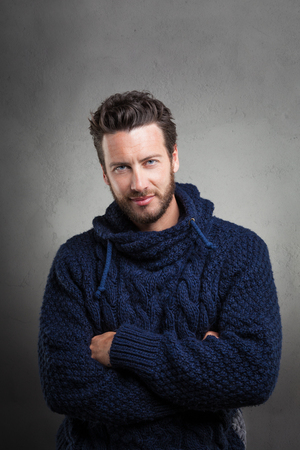 Portrait of Charming Bearded Man wearing blue sweaterの写真素材